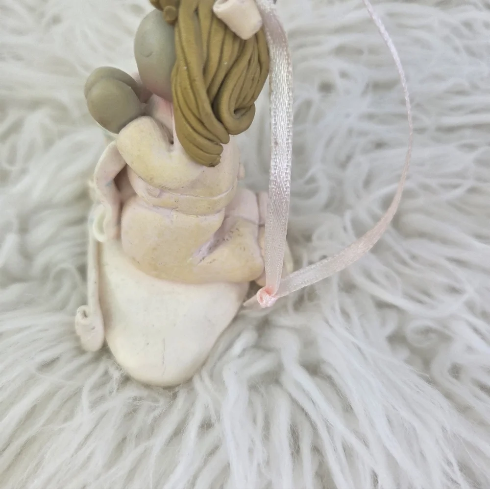 Hallmark Keepsake Mary's Angel Lily Collection Holiday Ornament